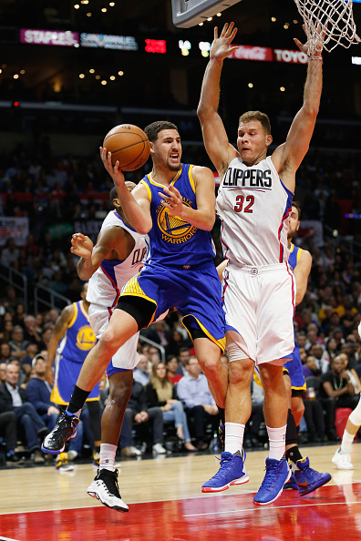 LOS ANGELES, CA - NOVEMBER 19: Klay Thompson #11 of the Golden State Warriors passes the ball past Blake Griffin #32 of the Los Angeles Clippers during the first half of a game at Staples Center on November 19, 2015 in Los Angeles, California. NOTE TO USER: User expressly acknowledges and agrees that, by downloading and or using this photograph, User is consenting to the terms and conditions of the Getty Images License Agreement. (Photo by Sean M. Haffey/Getty Images)