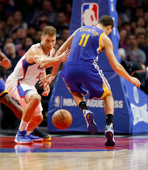 LOS ANGELES, CA - NOVEMBER 19: Blake Griffin #32 of the Los Angeles Clippers battles Klay Thompson #11 of the Golden State Warriors for a loose ball during the second half of a game at Staples Center on November 19, 2015 in Los Angeles, California. NOTE TO USER: User expressly acknowledges and agrees that, by downloading and or using this photograph, User is consenting to the terms and conditions of the Getty Images License Agreement. (Photo by Sean M. Haffey/Getty Images)