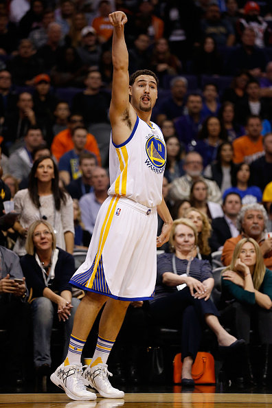 PHOENIX, AZ - NOVEMBER 27: Klay Thompson #11 of the Golden State Warriors reacts after hitting a three point shot against the Phoenix Suns during the first half of the NBA game at Talking Stick Resort Arena on November 27, 2015 in Phoenix, Arizona. NOTE TO USER: User expressly acknowledges and agrees that, by downloading and or using this photograph, User is consenting to the terms and conditions of the Getty Images License Agreement. (Photo by Christian Petersen/Getty Images)