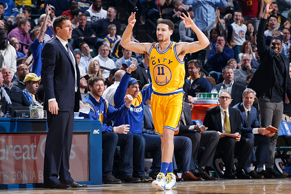 INDIANAPOLIS, IN - DECEMBER 8: Klay Thompson #11 of the Golden State Warriors reacts after making a three-point basket against the Indiana Pacers in the first half of the game at Bankers Life Fieldhouse on December 8, 2015 in Indianapolis, Indiana. NOTE TO USER: User expressly acknowledges and agrees that, by downloading and or using the photograph, User is consenting to the terms and conditions of the Getty Images License Agreement. (Photo by Joe Robbins/Getty Images)