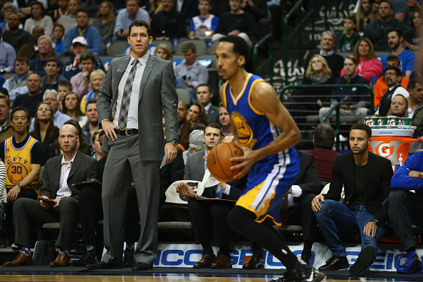 DALLAS, TX - DECEMBER 30: Interim head coach Luke Walton of the Golden State Warriors and Stephen Curry #30 during a game against the Dallas Mavericks at American Airlines Center on December 30, 2015 in Dallas, Texas. NOTE TO USER: User expressly acknowledges and agrees that, by downloading and or using photograph, User is consenting to the terms and conditions of the Getty Images License Agreement. (Photo by Ronald Martinez/Getty Images)
