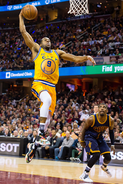 CLEVELAND, OH - JANUARY 18: Andre Iguodala #9 of the Golden State Warriors dunks over Kyrie Irving #2 of the Cleveland Cavaliers during the first half at Quicken Loans Arena on January 18, 2016 in Cleveland, Ohio. NOTE TO USER: User expressly acknowledges and agrees that, by downloading and/or using this photograph, user is consenting to the terms and conditions of the Getty Images License Agreement. Mandatory copyright notice. (Photo by Jason Miller/Getty Images)