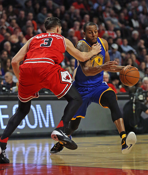 CHICAGO, IL - JANUARY 20: Andre Iguodala #9 of the Golden State Warriors drives against Doug McDermott #3 of the Chicago Bulls at the United Center on January 20, 2016 in Chicago, Illinois. NOTE TO USER: User expressly acknowledges and agrees that, by downloading and or using the photograph, User is consenting to the terms and conditions of the Getty Images License Agreement. (Photo by Jonathan Daniel/Getty Images)