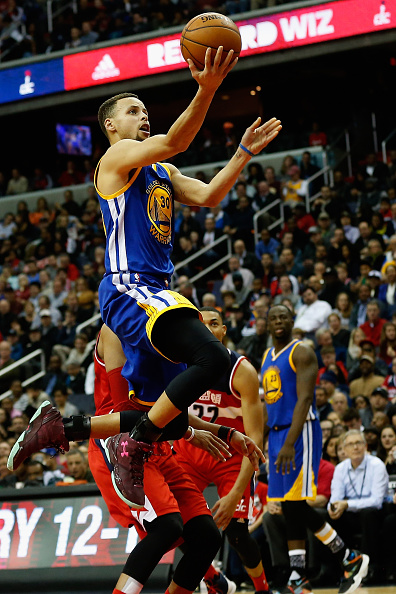 WASHINGTON, DC - FEBRUARY 03: Stephen Curry #30 of the Golden State Warriors puts up a shot against the Washington Wizards in the first half at Verizon Center on February 3, 2016 in Washington, DC. NOTE TO USER: User expressly acknowledges and agrees that, by downloading and or using this photograph, User is consenting to the terms and conditions of the Getty Images License Agreement. (Photo by Rob Carr/Getty Images)