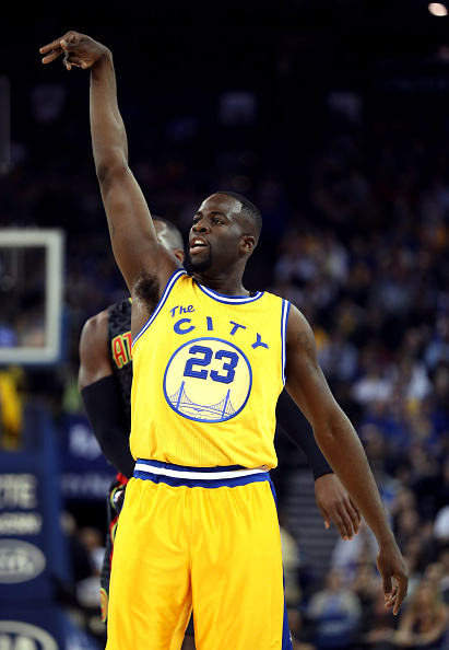 OAKLAND, CA - MARCH 01: Draymond Green #23 of the Golden State Warriors reacts after making a basket against the Atlanta Hawks at ORACLE Arena on March 1, 2016 in Oakland, California. NOTE TO USER: User expressly acknowledges and agrees that, by downloading and or using this photograph, User is consenting to the terms and conditions of the Getty Images License Agreement. (Photo by Ezra Shaw/Getty Images)