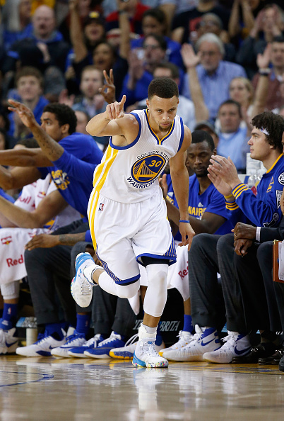 OAKLAND, CA - MARCH 14: Stephen Curry #30 of the Golden State Warriors reacts after making a three-point basket against the New Orleans Pelicans at ORACLE Arena on March 14, 2016 in Oakland, California. NOTE TO USER: User expressly acknowledges and agrees that, by downloading and or using this photograph, User is consenting to the terms and conditions of the Getty Images License Agreement. (Photo by Ezra Shaw/Getty Images)