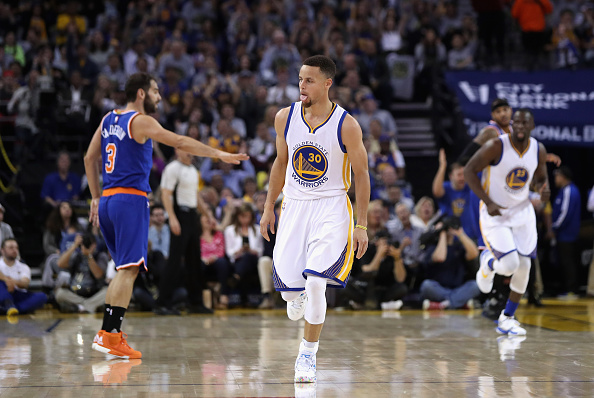 OAKLAND, CA - MARCH 16: Stephen Curry #30 of the Golden State Warriors reacts after making a three-point basket against the New York Knicks at ORACLE Arena on March 16, 2016 in Oakland, California. NOTE TO USER: User expressly acknowledges and agrees that, by downloading and or using this photograph, User is consenting to the terms and conditions of the Getty Images License Agreement. (Photo by Ezra Shaw/Getty Images)