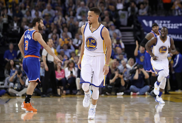 OAKLAND, CA - MARCH 16: Stephen Curry #30 of the Golden State Warriors reacts after making a three-point basket against the New York Knicks at ORACLE Arena on March 16, 2016 in Oakland, California. NOTE TO USER: User expressly acknowledges and agrees that, by downloading and or using this photograph, User is consenting to the terms and conditions of the Getty Images License Agreement. (Photo by Ezra Shaw/Getty Images)