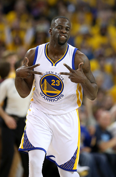 OAKLAND, CA - APRIL 27: Draymond Green #23 of the Golden State Warriors reacts after making a basket against the Houston Rockets in Game Five of the Western Conference Quarterfinals during the 2016 NBA Playoffs at ORACLE Arena on April 27, 2016 in Oakland, California. NOTE TO USER: User expressly acknowledges and agrees that, by downloading and or using this photograph, user is consenting to the terms and conditions of Getty Images License Agreement. (Photo by Ezra Shaw/Getty Images)