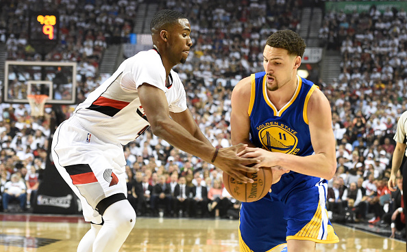 PORTLAND, OR - MAY 9: Maurice Harkless #4 of the Portland Trail Blazers defends Klay Thompson #11 of the Golden State Warriors during the first quarter of Game Four of the Western Conference Semifinals during the 2016 NBA Playoffs at the Moda Center on May 9, 2016 in Portland, Oregon. NOTE TO USER: User expressly acknowledges and agrees that by downloading and/or using this photograph, user is consenting to the terms and conditions of the Getty Images License Agreement. (Photo by Steve Dykes/Getty Images)