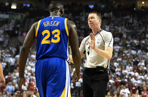 PORTLAND, OR - MAY 9: Draymond Green #23 of the Golden State Warriors confronts referee Ed Malloy #14 during the first quarter of Game Four of the Western Conference Semifinals against the Portland Trail Blazers during the 2016 NBA Playoffs at the Moda Center on May 9, 2016 in Portland, Oregon. NOTE TO USER: User expressly acknowledges and agrees that by downloading and/or using this photograph, user is consenting to the terms and conditions of the Getty Images License Agreement. (Photo by Steve Dykes/Getty Images)