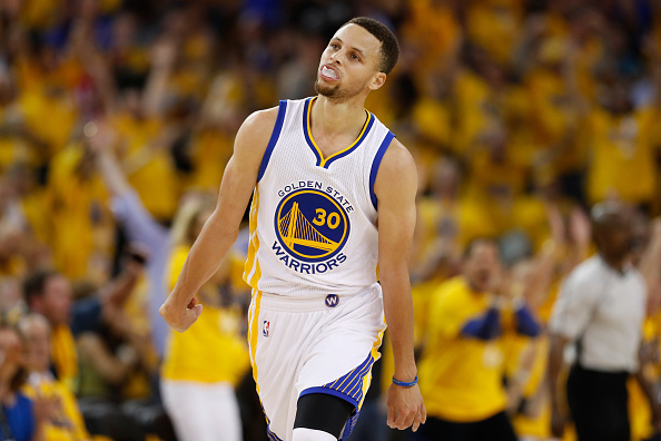 OAKLAND, CA - MAY 16: Stephen Curry #30 of the Golden State Warriors reacts to a basket against the Oklahoma City Thunder during game one of the NBA Western Conference Final at ORACLE Arena on May 16, 2016 in Oakland, California. NOTE TO USER: User expressly acknowledges and agrees that, by downloading and or using this photograph, User is consenting to the terms and conditions of the Getty Images License Agreement. (Photo by Christian Petersen/Getty Images)
