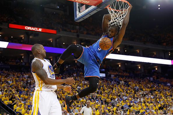 OAKLAND, CA - MAY 16: Serge Ibaka #9 of the Oklahoma City Thunder dunks the ball against the Golden State Warriors during game one of the NBA Western Conference Final at ORACLE Arena on May 16, 2016 in Oakland, California. NOTE TO USER: User expressly acknowledges and agrees that, by downloading and or using this photograph, User is consenting to the terms and conditions of the Getty Images License Agreement. (Photo by Christian Petersen/Getty Images)