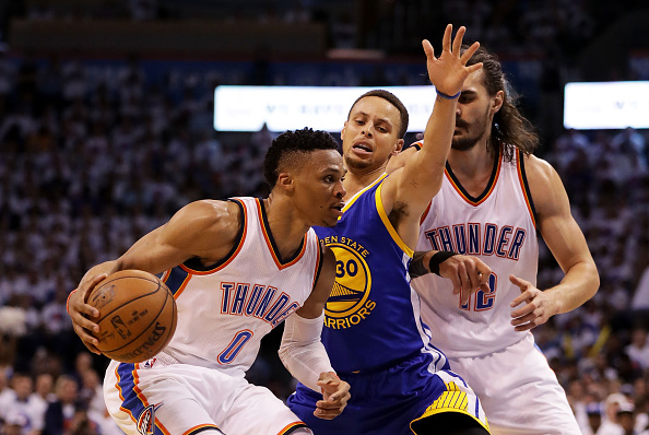 OKLAHOMA CITY, OK - MAY 24: Russell Westbrook #0 of the Oklahoma City Thunder drives against Stephen Curry #30 of the Golden State Warriors in the third quarter in game four of the Western Conference Finals during the 2016 NBA Playoffs at Chesapeake Energy Arena on May 24, 2016 in Oklahoma City, Oklahoma. NOTE TO USER: User expressly acknowledges and agrees that, by downloading and or using this photograph, User is consenting to the terms and conditions of the Getty Images License Agreement. (Photo by Ronald Martinez/Getty Images)