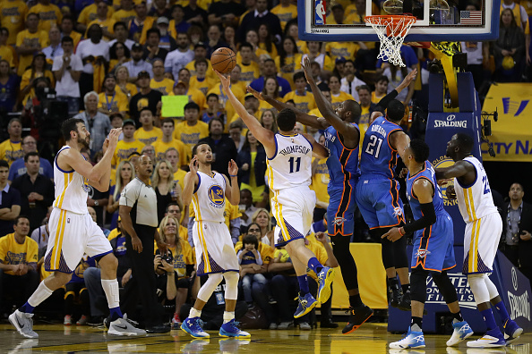 OAKLAND, CA - MAY 26: Klay Thompson #11 of the Golden State Warriors throws up a shot against the Oklahoma City Thunder during Game Five of the Western Conference Finals during the 2016 NBA Playoffs at ORACLE Arena on May 26, 2016 in Oakland, California. (Photo by Ezra Shaw/Getty Images)