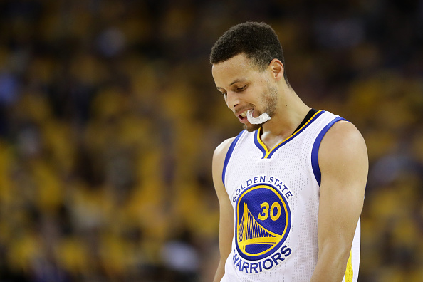 OAKLAND, CA - MAY 30: Stephen Curry #30 of the Golden State Warriors reacts after a play in Game Seven of the Western Conference Finals against the Oklahoma City Thunder during the 2016 NBA Playoffs at ORACLE Arena on May 30, 2016 in Oakland, California. NOTE TO USER: User expressly acknowledges and agrees that, by downloading and or using this photograph, User is consenting to the terms and conditions of the Getty Images License Agreement. (Photo by Ezra Shaw/Getty Images)