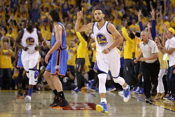 OAKLAND, CA - MAY 30: Stephen Curry #30 of the Golden State Warriors reacts after a three-point shot in Game Seven of the Western Conference Finals against the Oklahoma City Thunder during the 2016 NBA Playoffs at ORACLE Arena on May 30, 2016 in Oakland, California. NOTE TO USER: User expressly acknowledges and agrees that, by downloading and or using this photograph, User is consenting to the terms and conditions of the Getty Images License Agreement. (Photo by Ezra Shaw/Getty Images)