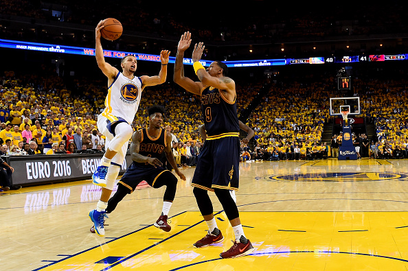 OAKLAND, CA - JUNE 02: Stephen Curry #30 of the Golden State Warriors goes up for a shot against Channing Frye #9 of the Cleveland Cavaliers in the first half in Game 1 of the 2016 NBA Finals at ORACLE Arena on June 2, 2016 in Oakland, California. NOTE TO USER: User expressly acknowledges and agrees that, by downloading and or using this photograph, User is consenting to the terms and conditions of the Getty Images License Agreement. (Photo by Bob Donnan/Pool/Getty Images)