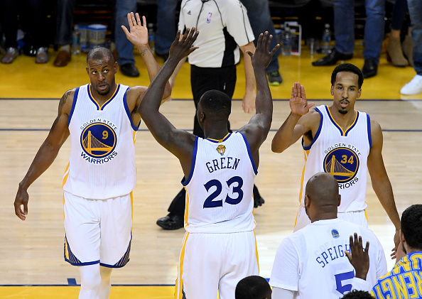 OAKLAND, CA - JUNE 05: Andre Iguodala #9, Draymond Green #23 and Shaun Livingston #34 of the Golden State Warriors react during Game 2 of the 2016 NBA Finals against the Cleveland Cavaliers at ORACLE Arena on June 5, 2016 in Oakland, California. NOTE TO USER: User expressly acknowledges and agrees that, by downloading and or using this photograph, User is consenting to the terms and conditions of the Getty Images License Agreement. (Photo by Thearon W. Henderson/Getty Images)