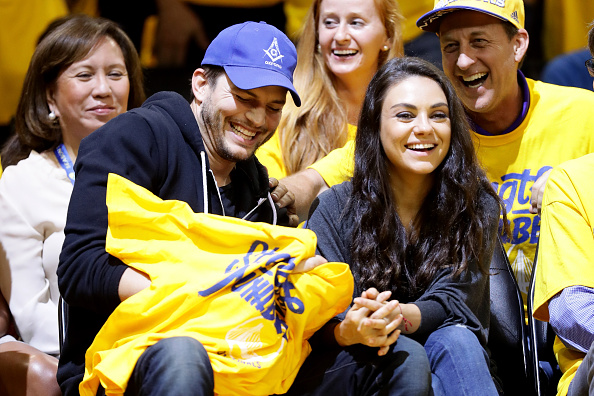 OAKLAND, CA - JUNE 05: (L-R) Actors Ashton Kutcher and Mila Kunis attend Game 2 of the 2016 NBA Finals between the Golden State Warriors and the Cleveland Cavaliers at ORACLE Arena on June 5, 2016 in Oakland, California. NOTE TO USER: User expressly acknowledges and agrees that, by downloading and or using this photograph, User is consenting to the terms and conditions of the Getty Images License Agreement. (Photo by Ezra Shaw/Getty Images)