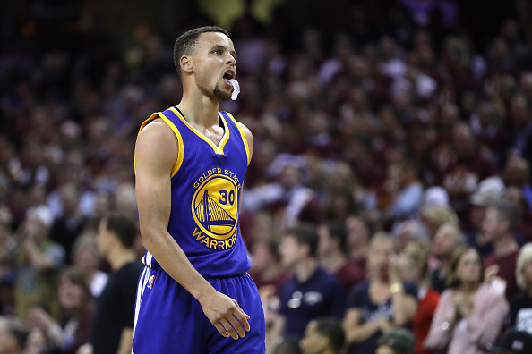 CLEVELAND, OH - JUNE 08: Stephen Curry #30 of the Golden State Warriors reacts during the first half against the Cleveland Cavaliers in Game 3 of the 2016 NBA Finals at Quicken Loans Arena on June 8, 2016 in Cleveland, Ohio. NOTE TO USER: User expressly acknowledges and agrees that, by downloading and or using this photograph, User is consenting to the terms and conditions of the Getty Images License Agreement. (Photo by Ronald Martinez/Getty Images)