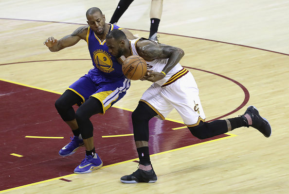 CLEVELAND, OH - JUNE 10: LeBron James #23 of the Cleveland Cavaliers drives against Andre Iguodala #9 of the Golden State Warriors during the first half in Game 4 of the 2016 NBA Finals at Quicken Loans Arena on June 10, 2016 in Cleveland, Ohio. NOTE TO USER: User expressly acknowledges and agrees that, by downloading and or using this photograph, User is consenting to the terms and conditions of the Getty Images License Agreement. (Photo by Ronald Martinez/Getty Images)