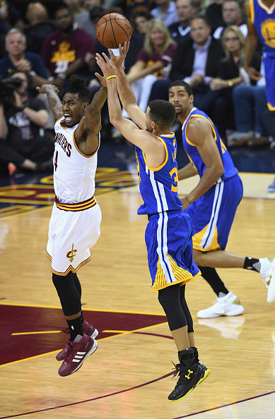 CLEVELAND, OH - JUNE 10: Stephen Curry #30 of the Golden State Warriors shoots the ball against Iman Shumpert #4 of the Cleveland Cavaliers during the first half in Game 4 of the 2016 NBA Finals at Quicken Loans Arena on June 10, 2016 in Cleveland, Ohio. NOTE TO USER: User expressly acknowledges and agrees that, by downloading and or using this photograph, User is consenting to the terms and conditions of the Getty Images License Agreement. (Photo by Jason Miller/Getty Images)