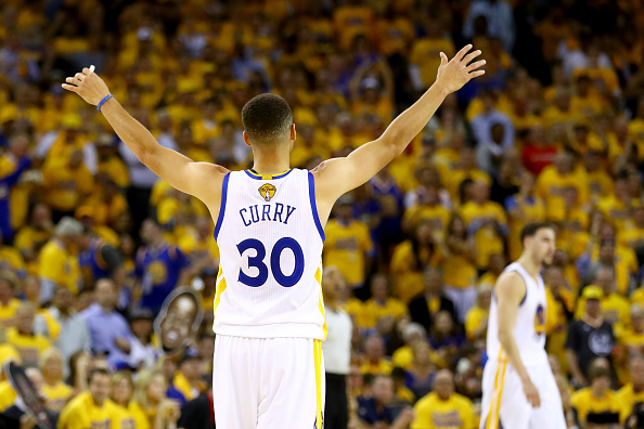 OAKLAND, CA - JUNE 13: Stephen Curry #30 of the Golden State Warriors celebrates against the Cleveland Cavaliers during the second quarter in Game 5 of the 2016 NBA Finals at ORACLE Arena on June 13, 2016 in Oakland, California. NOTE TO USER: User expressly acknowledges and agrees that, by downloading and or using this photograph, User is consenting to the terms and conditions of the Getty Images License Agreement. (Photo by Ezra Shaw/Getty Images)