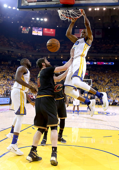 OAKLAND, CA - JUNE 13: Andre Iguodala #9 of the Golden State Warriors dunks the ball over Kevin Love #0 of the Cleveland Cavaliers during the first quarter in Game 5 of the 2016 NBA Finals at ORACLE Arena on June 13, 2016 in Oakland, California. NOTE TO USER: User expressly acknowledges and agrees that, by downloading and or using this photograph, User is consenting to the terms and conditions of the Getty Images License Agreement. (Photo by Bob Donnan - Pool/Getty Images)