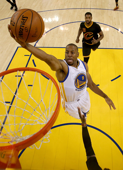OAKLAND, CA - JUNE 13: Andre Iguodala #9 of the Golden State Warriors lays the ball up in the first half ahead of Tristan Thompson #13 of the Cleveland Cavaliers in Game 5 of the 2016 NBA Finals at ORACLE Arena on June 13, 2016 in Oakland, California. NOTE TO USER: User expressly acknowledges and agrees that, by downloading and or using this photograph, User is consenting to the terms and conditions of the Getty Images License Agreement. (Photo by Ezra Shaw/Getty Images)