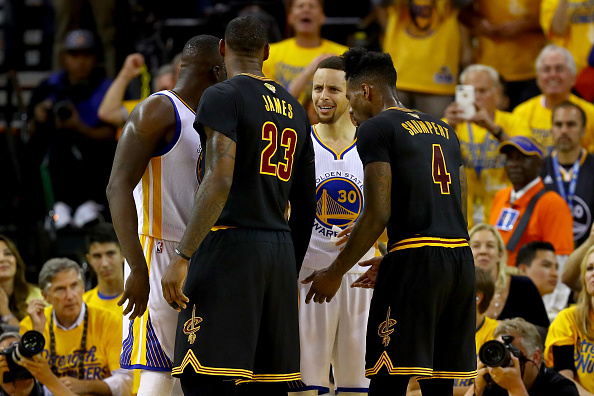 OAKLAND, CA - JUNE 19: Stephen Curry #30 of the Golden State Warriors and LeBron James #23 of the Cleveland Cavaliers exchange words in Game 7 of the 2016 NBA Finals at ORACLE Arena on June 19, 2016 in Oakland, California. NOTE TO USER: User expressly acknowledges and agrees that, by downloading and or using this photograph, User is consenting to the terms and conditions of the Getty Images License Agreement. (Photo by Ezra Shaw/Getty Images)