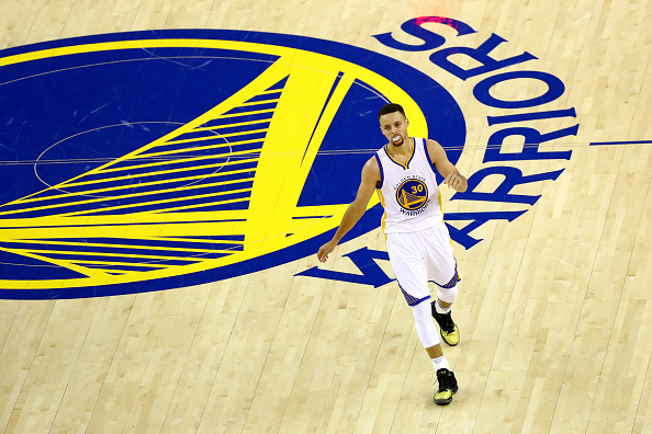 OAKLAND, CA - JUNE 19: Stephen Curry #30 of the Golden State Warriors reacts to a play in Game 7 of the 2016 NBA Finals against the Cleveland Cavaliers at ORACLE Arena on June 19, 2016 in Oakland, California. NOTE TO USER: User expressly acknowledges and agrees that, by downloading and or using this photograph, User is consenting to the terms and conditions of the Getty Images License Agreement. (Photo by Ezra Shaw/Getty Images)