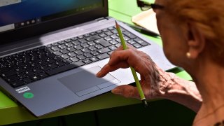 Elderly Person on Computer