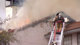 A three-alarm fire was reported just before 11:30 a.m. at the complex in the 1200 block of Meadow Creek Drive.