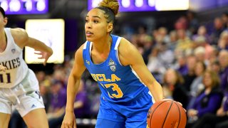 Jaden Owens #13 of the UCLA Bruins controls the ball during the first half of the game against the Washington Huskies at Alaska Airlines Arena on February 23, 2020 in Seattle, Washington. The Washington Huskies topped the UCLA Bruins, 74-68.