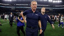 Head coach Jason Garrett of the Dallas Cowboys walks across the field after beating the Washington Redskins 47-16 in the game at AT&T Stadium on Dec. 29, 2019 in Arlington, Texas.