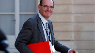In this undated file photo, Jean Castex leaves after a videoconference with the French President and French mayors at the Elysee Palace in Paris. Castex was named the new Prime Minister of France on July 3, 2020.
