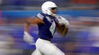 Journey Brown #4 of the Penn State Nittany Lions scores a touchdown against the Memphis Tigers in the second quarter at AT&T Stadium on Dec. 28, 2019 in Arlington, Texas.