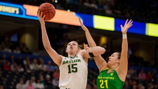 Baylor forward Lauren Cox (15) attempts a layup against Oregon forward Erin Boley (21) in 2019 NCAA Women's National Semifinal Game One between the Oregon Ducks and the Baylor Bears at at Amelie Arena in Tampa, Florida on on April 5, 2019.