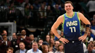 Luka Doncic #77 of the Dallas Mavericks smiles during the game against the New Orleans Pelicans on Dec. 7, 2019 at the American Airlines Center in Dallas, Texas.
