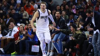 Luka Doncic #77 of the Dallas Mavericks celebrates during a game between Dallas Mavericks and Detroit Pistons at Arena Ciudad de Mexico on Dec. 12, 2019 in Mexico City, Mexico.