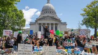 In this May 30, 2020, file photo, protesters gather on the steps of the Wisconsin Capitol during a peaceful protest in Madison, WI.