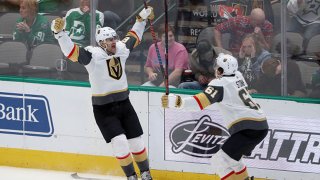 Max Pacioretty #67 of the Vegas Golden Knights celebrates with Mark Stone #61 of the Vegas Golden Knights after scoring the game winning goal against the Dallas Stars in overtime at American Airlines Center on Dec. 13, 2019 in Dallas, Texas.