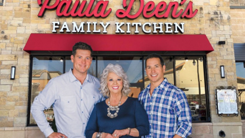 Paula Deen and sons in front of new restaurant in Fairview