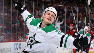 Roope Hintz #24 of the Dallas Stars celebrates after scoring a goal against the Arizona Coyotes during the third period of the NHL game at Gila River Arena on Dec. 29, 2019 in Glendale, Arizona. The Stars defeated the Coyotes 4-2.