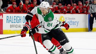 Roope Hintz #24 of the Dallas Stars skates with the puck during an NHL game against the Carolina Hurricanes at PNC Arena on Feb. 25, 2020 in Raleigh, North Carolina.