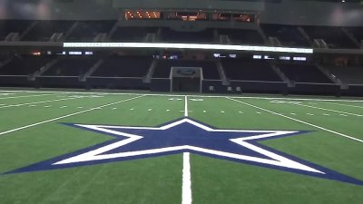 Dallas Cowboys open sparkling facility, try to focus on football