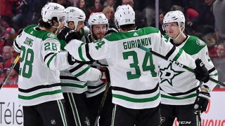 Tyler Seguin #91 of the Dallas Stars celebrates with teammates after scoring the winning goal against the Montreal Canadiens in the NHL game at the Bell Centre on Feb. 15, 2020 in Montreal, Quebec, Canada.