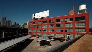 One of the new buildings would be on the parking lot next door to the Adam Hats Building on Canton Street just east of downtown Dallas.
