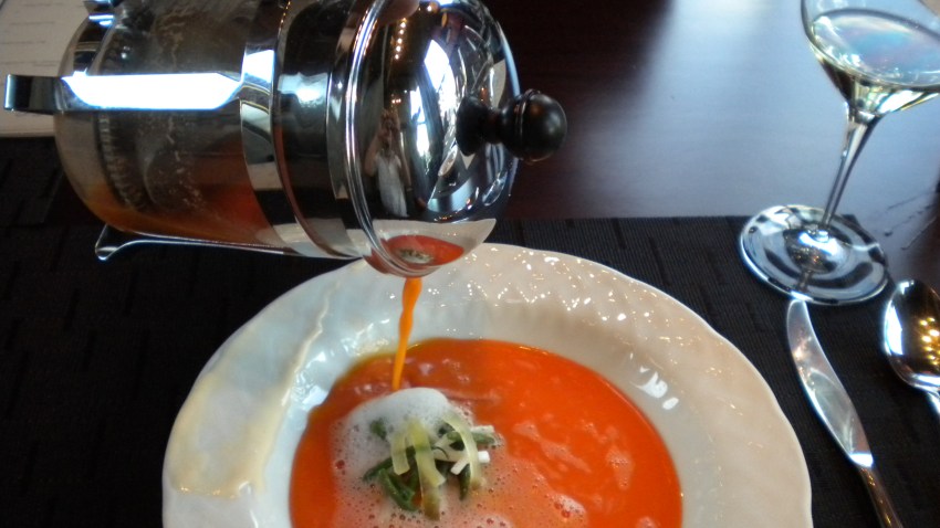 Watermelon soup poured over rinds and green beans at Red Velvet